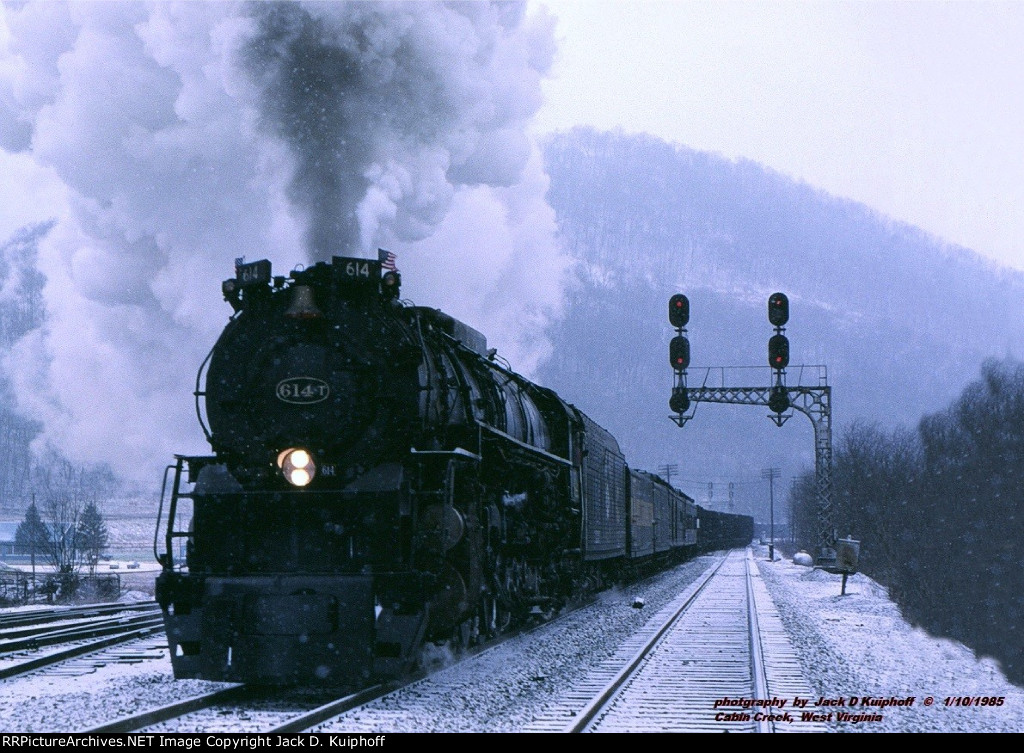 C&O 614T, 4-8-4 Greenbrier, running test for the ACE program, hauling coal on the C&O between Huntington, and Hinton WV at Cabin Creek, West Virginia. January 10, 1985. 